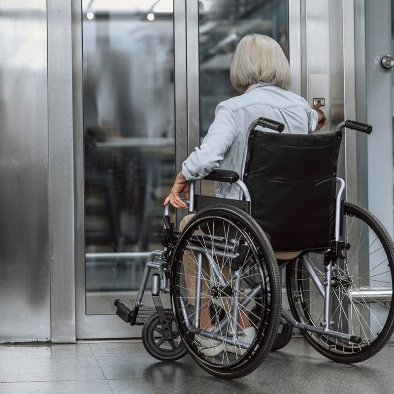 elderly-woman-in-wheelchair-using-lula-elevator